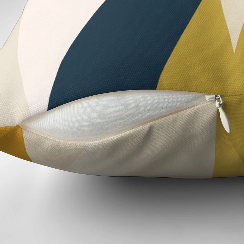 Minimalist geometric abstract throw pillow in mustard, navy, and blush tones