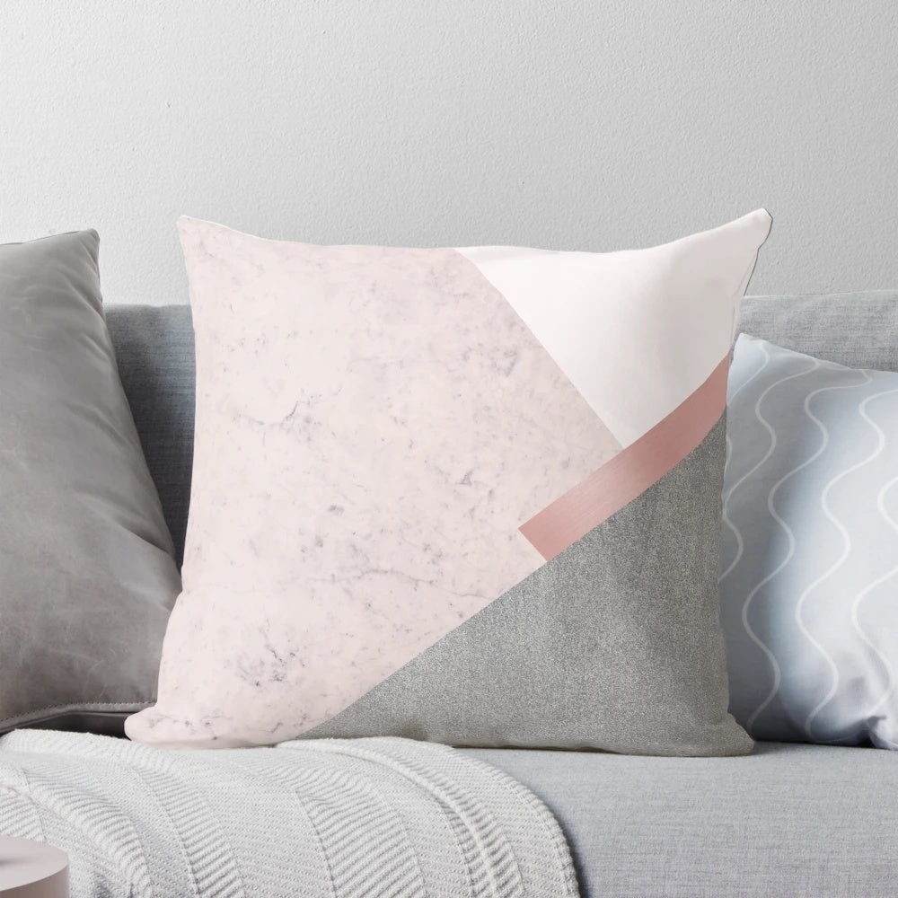 A minimalist, geometric-patterned throw pillow in a soft, pastel pink shade, perfect for a Scandinavian-inspired home decor.