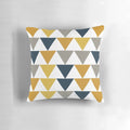 Minimalist geometric pattern pillow in mustard yellow, navy blue, and gray