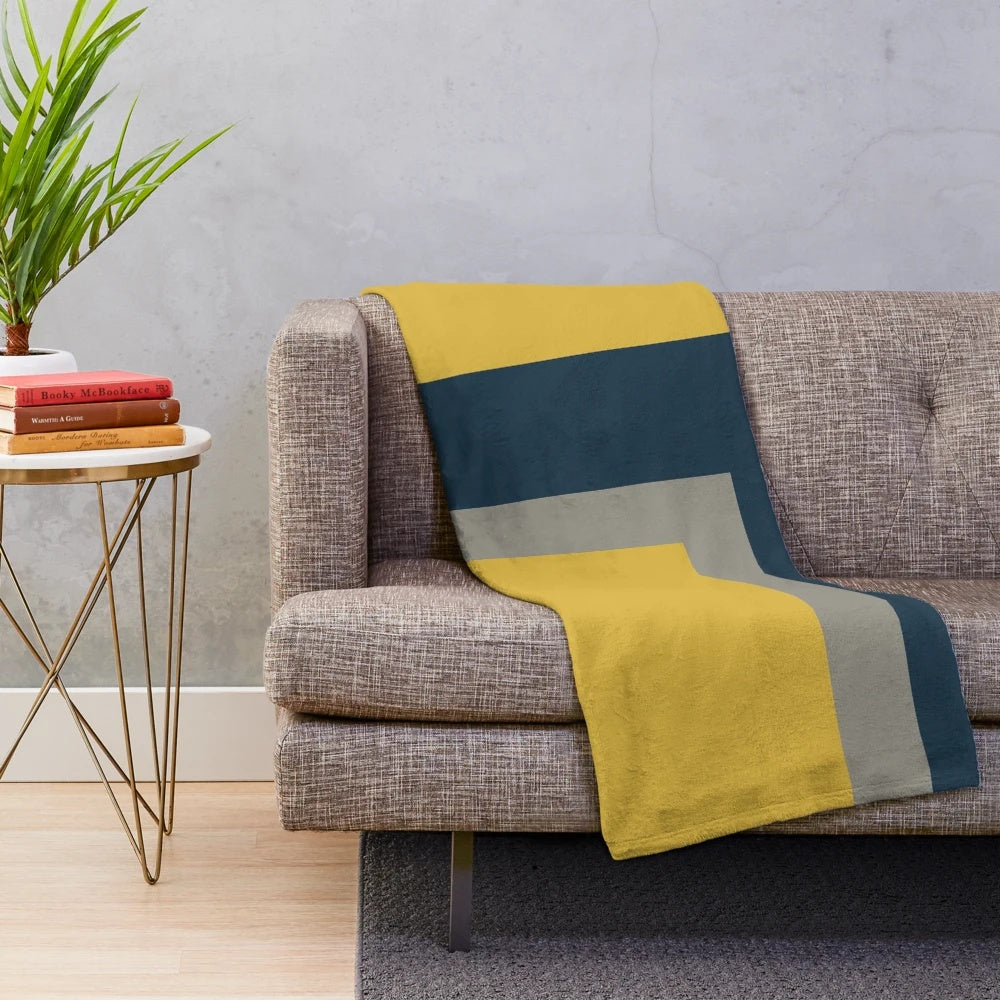 Minimalist geometric pattern plush blanket in mustard yellow, navy blue and grey