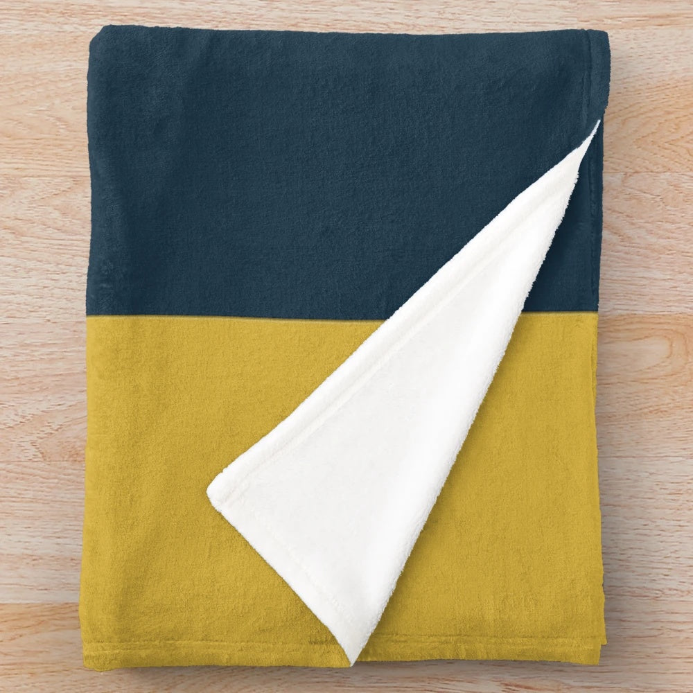 Minimalist geometric pattern plush blanket in mustard yellow, navy blue and grey