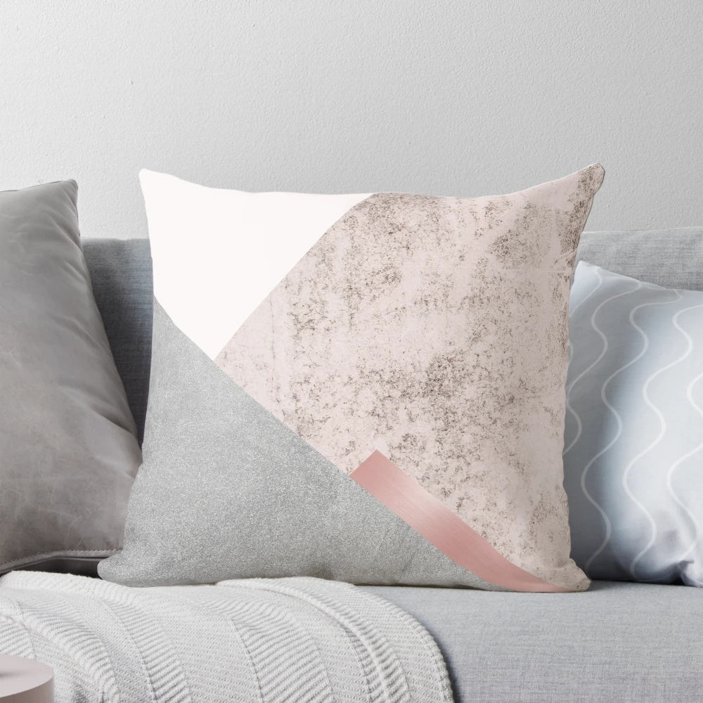 Minimalist, geometric pillow in pink and grey with scandinavian mountain design
