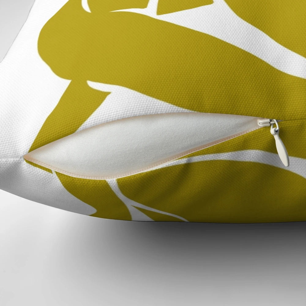 Mustard yellow pillow featuring a minimalist abstract figure inspired by the artwork of Henri Matisse