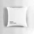 Minimalist black and white "Merry Christmas" text design on a decorative holiday pillow
