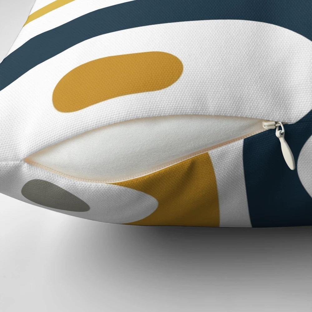 Minimalist mid century modern style pillow with an abstract pattern in navy blue, mustard, grey, and white