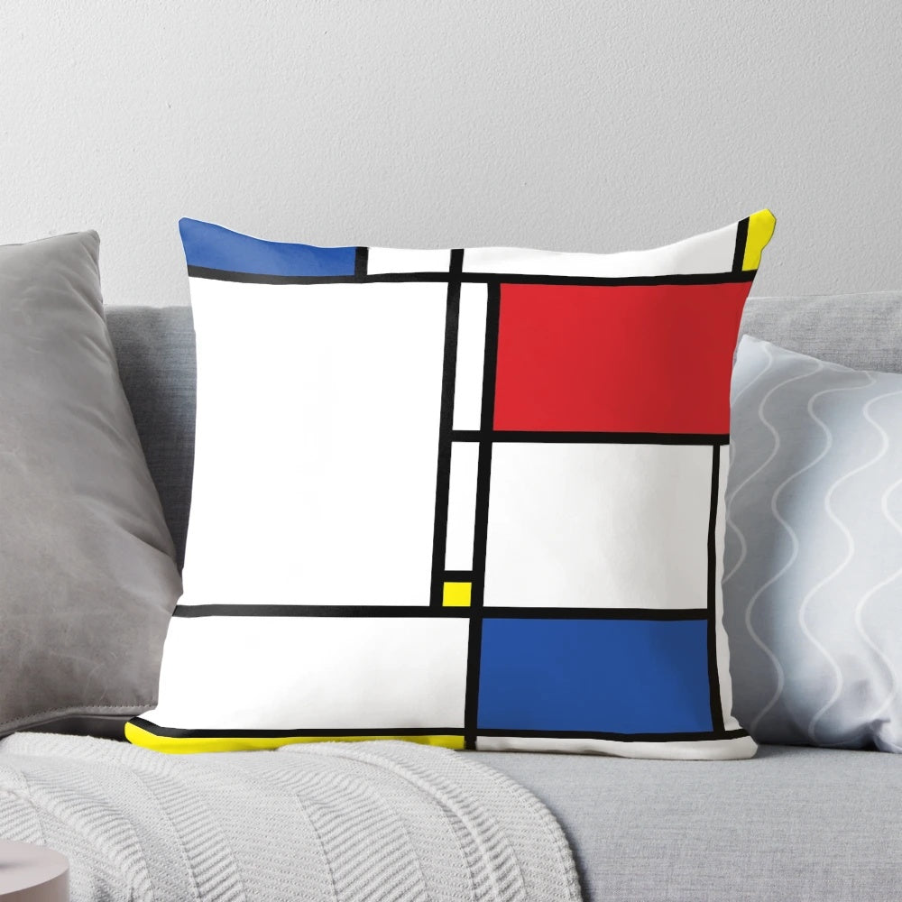Minimalist Mondrian-inspired De Stijl modern art pillow featuring bold, colorful geometric block design.