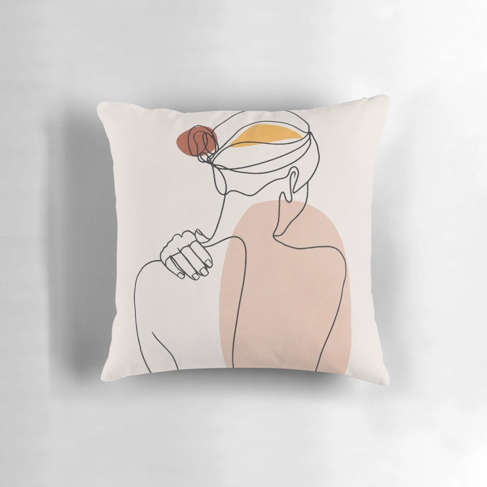 Minimalist black and white illustration of a nude female figure on a pillow.