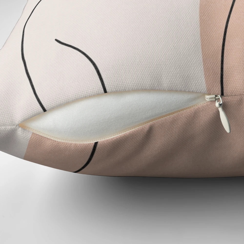 Minimalist black and white illustration of a nude female figure on a pillow.