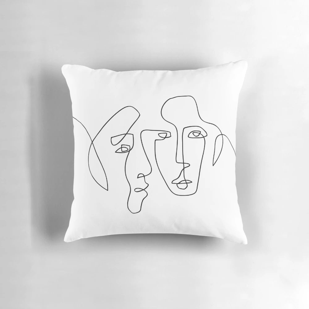 Minimalist abstract pillow with a continuous single line face design