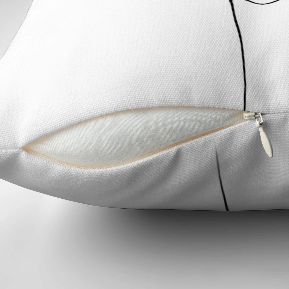 A minimalist one line art pillow featuring a simple peace sign hand design.
