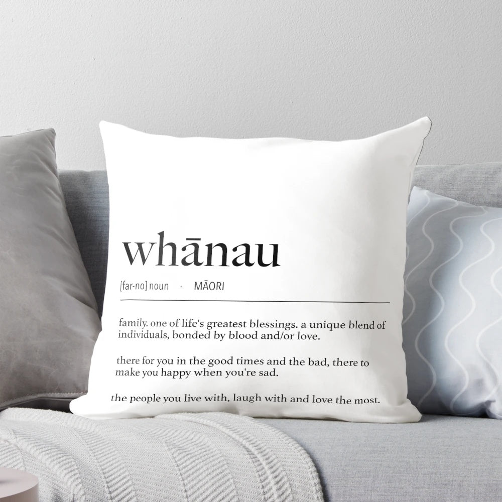Minimalist black and white pillow featuring the Maori word "whanau" meaning family