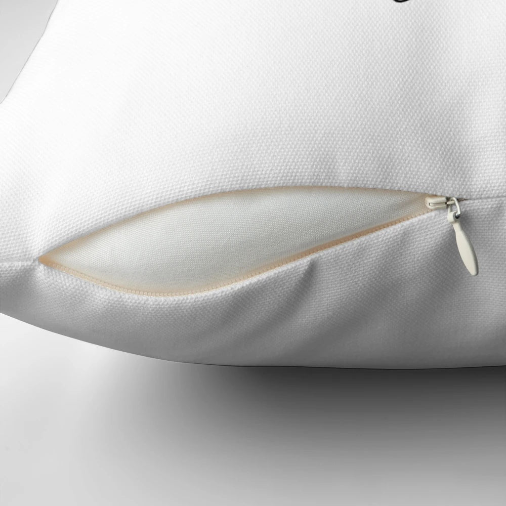 Minimalist line art design of two hands in a pinky swear gesture on a decorative pillow.