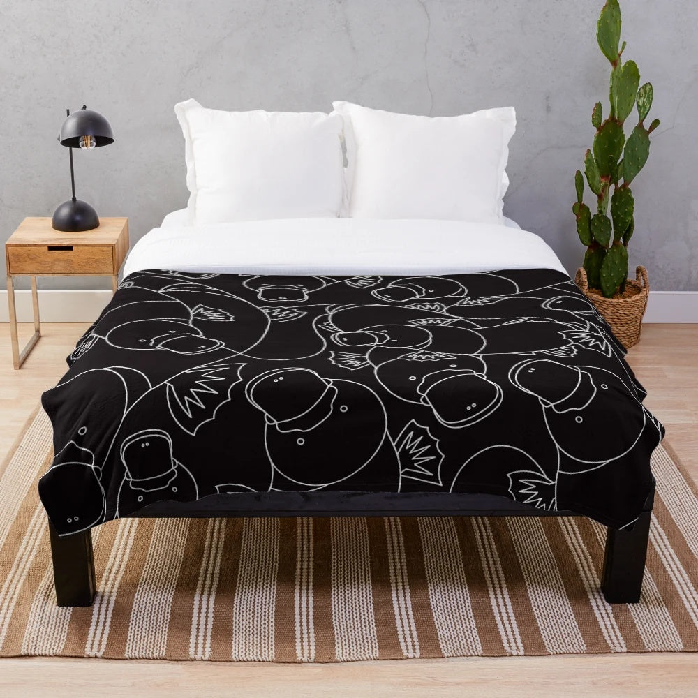 Minimalist platypus plush blanket in black and white line drawing design