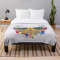 Minimalist plush blanket with a floral and leaf design, inspired by the A24 horror film Midsommar