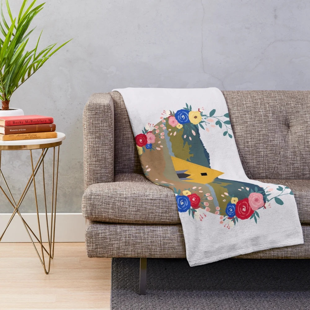 Minimalist plush blanket with a floral and leaf design, inspired by the A24 horror film Midsommar