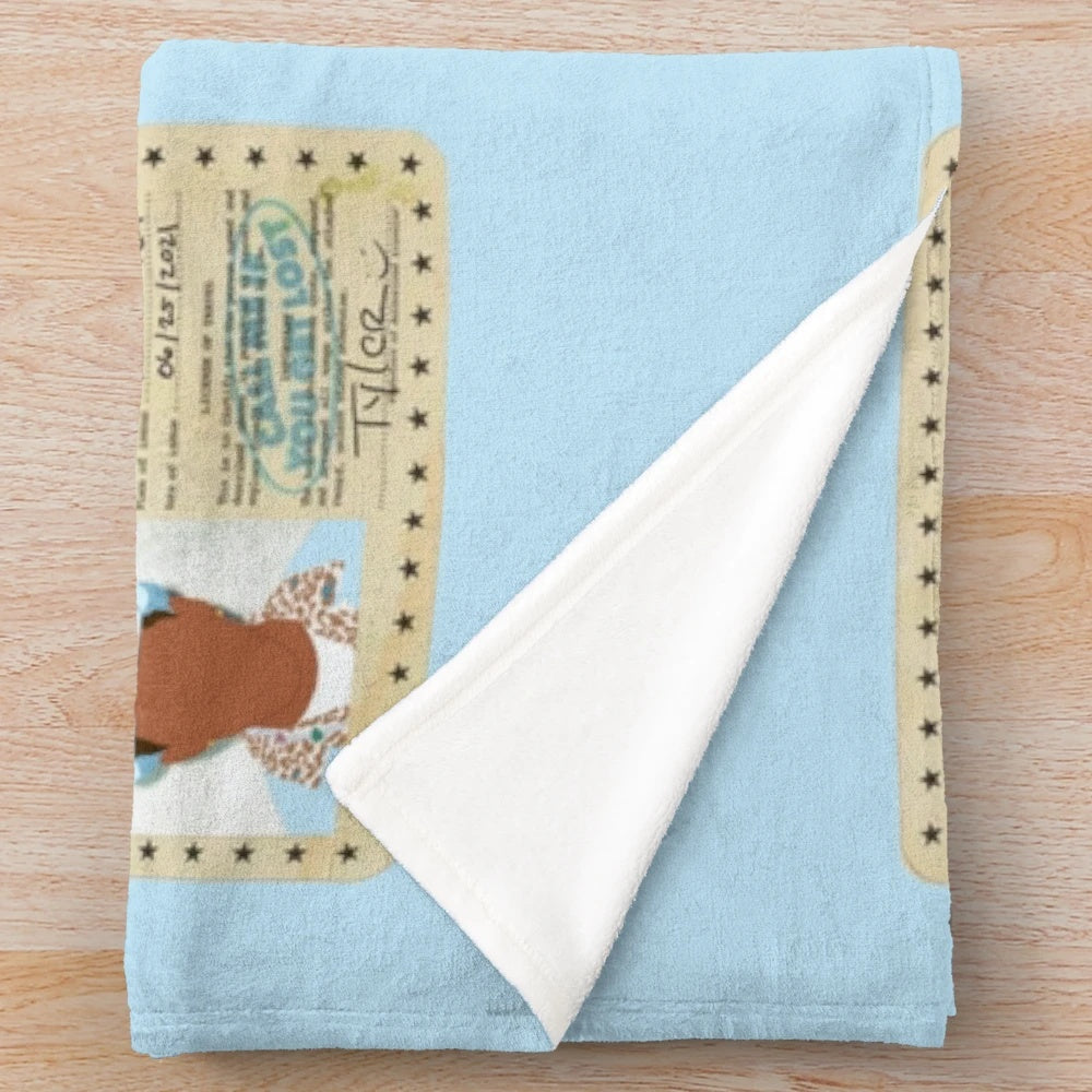 Minimalist plush blanket featuring Tyler the Creator's CMIYGL design
