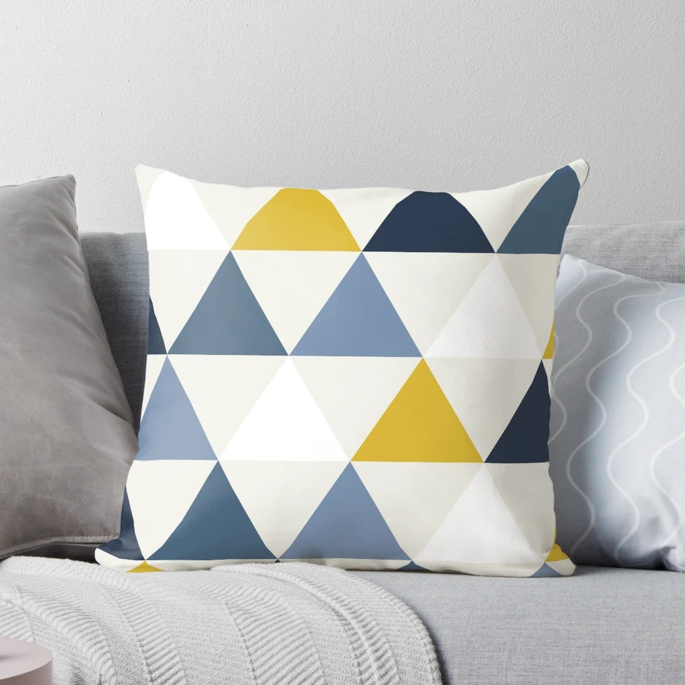 Scandinavian-inspired geometric pattern pillow in a modern, minimalist design featuring mustard, white, and blue colors.