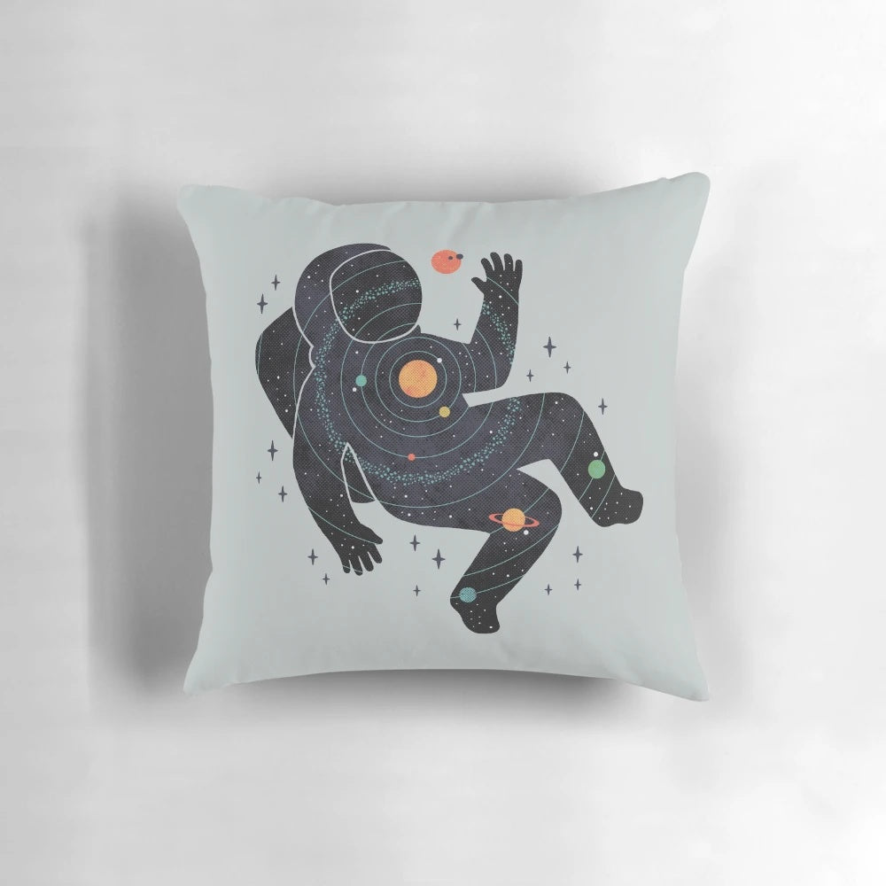 Minimalist space-themed pillow with a celestial design featuring planets, moons, and stars