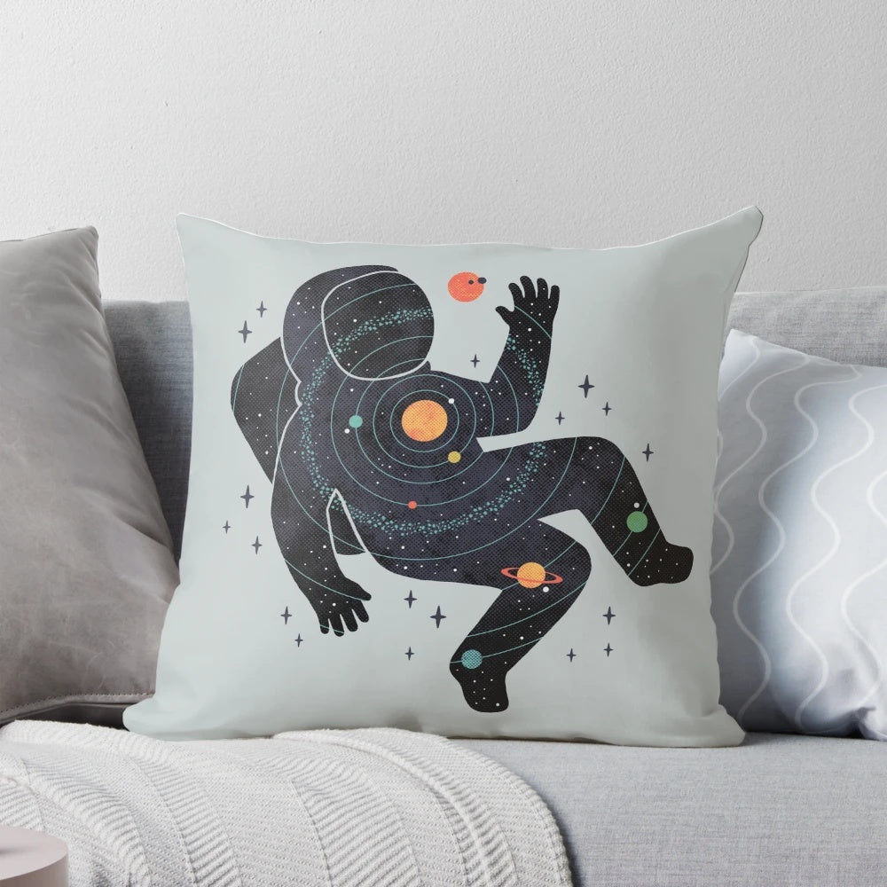 Minimalist space-themed pillow with a celestial design featuring planets, moons, and stars