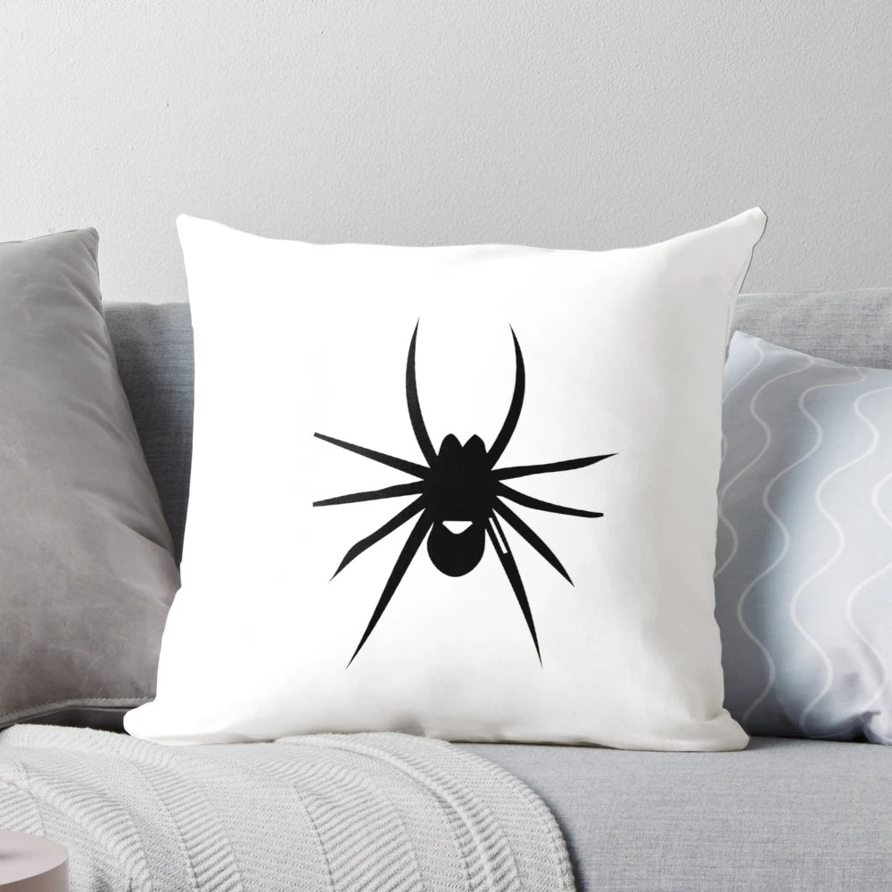 A stylish black and white spider silhouette pillow for modern home decor.