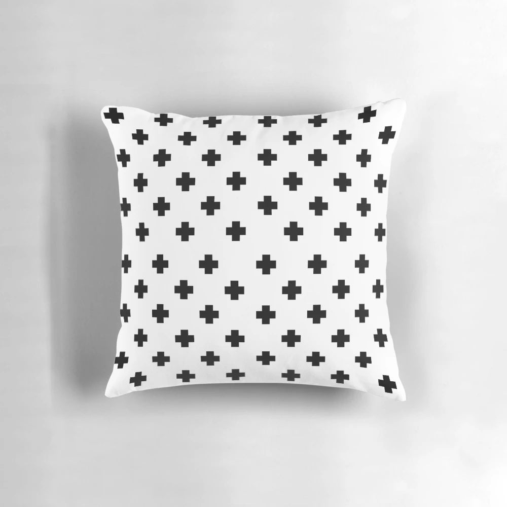 Black and white geometric Swiss cross pattern decorative pillow