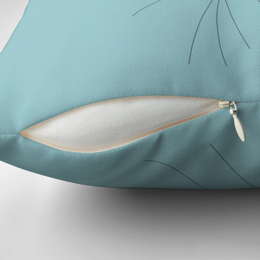 A minimalistic white flowers decorative pillow with soft pastel blue accents, perfect for nature-inspired home decor.