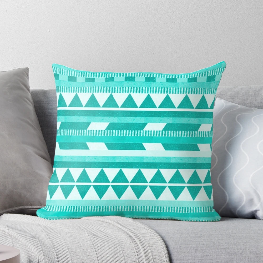 Mint green, aztec-patterned decorative throw pillow for modern, bohemian home decor