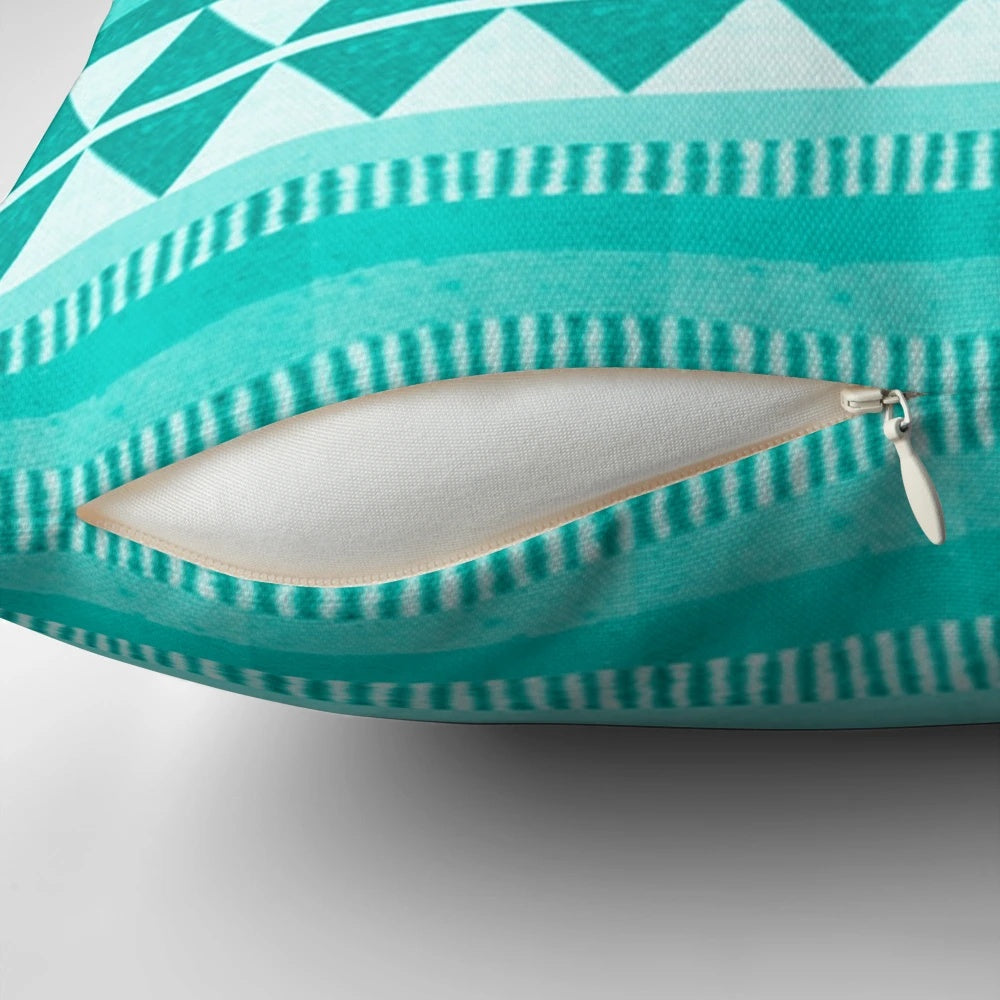 Mint green, aztec-patterned decorative throw pillow for modern, bohemian home decor