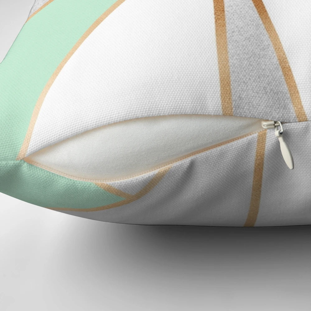 Mint green, grey, and gold geometric patterned decorative pillow for modern home accents