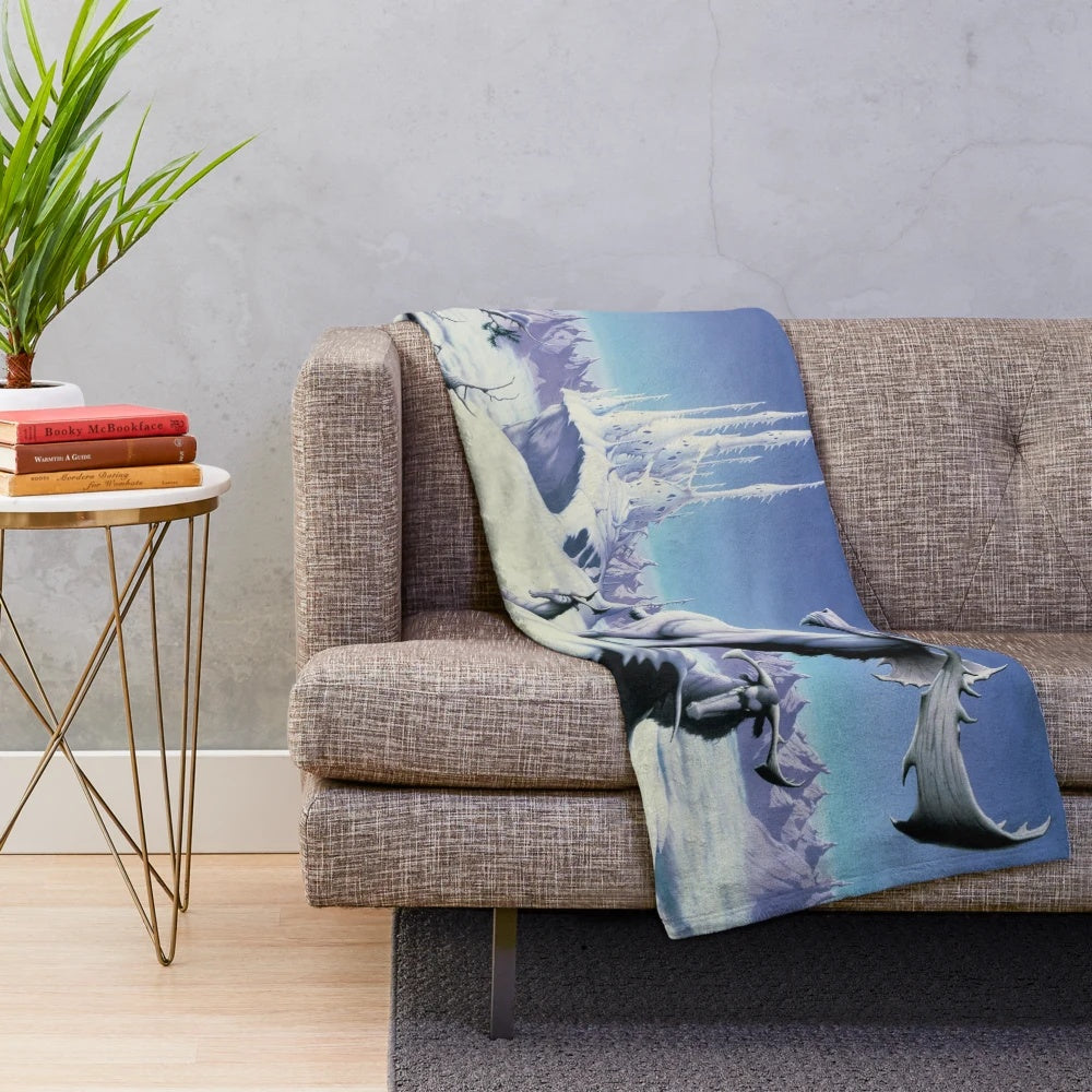 Mirador plush blanket featuring a winter wonderland scene with elk and moose