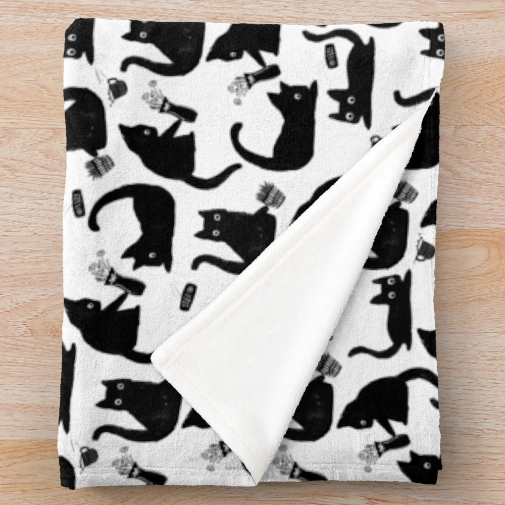 Mischievous cats silhouette pattern on a plush blanket
