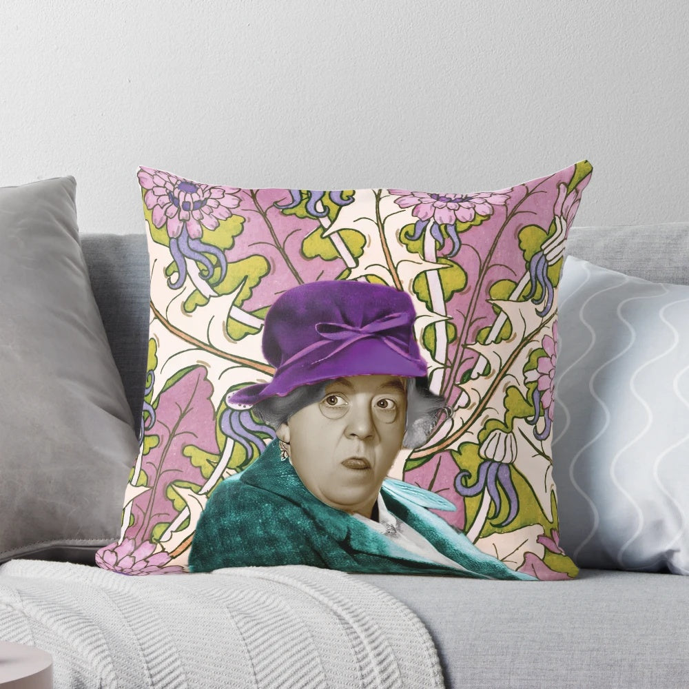 A colorful pillow featuring a whimsical portrait of Miss Marple, the beloved character from Agatha Christie's detective novels.