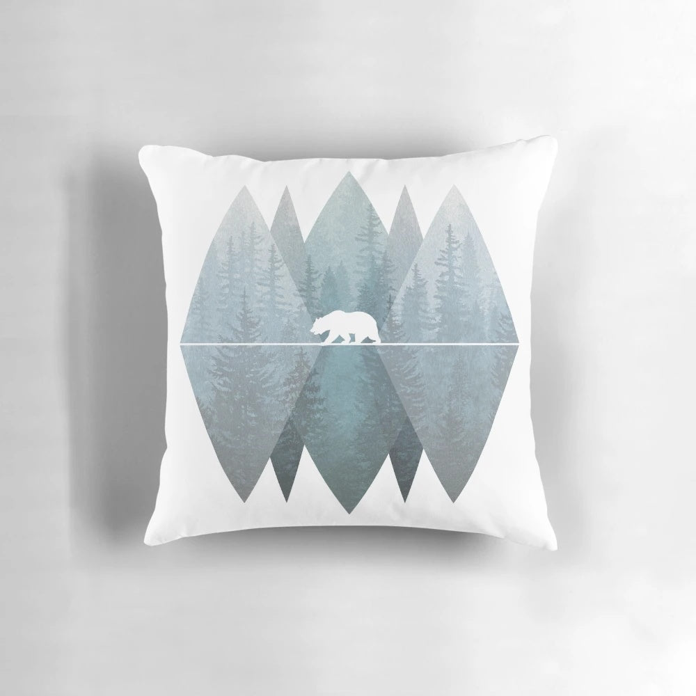 Misty forest mountain bear throw pillow with geometric triangle design in nature landscape