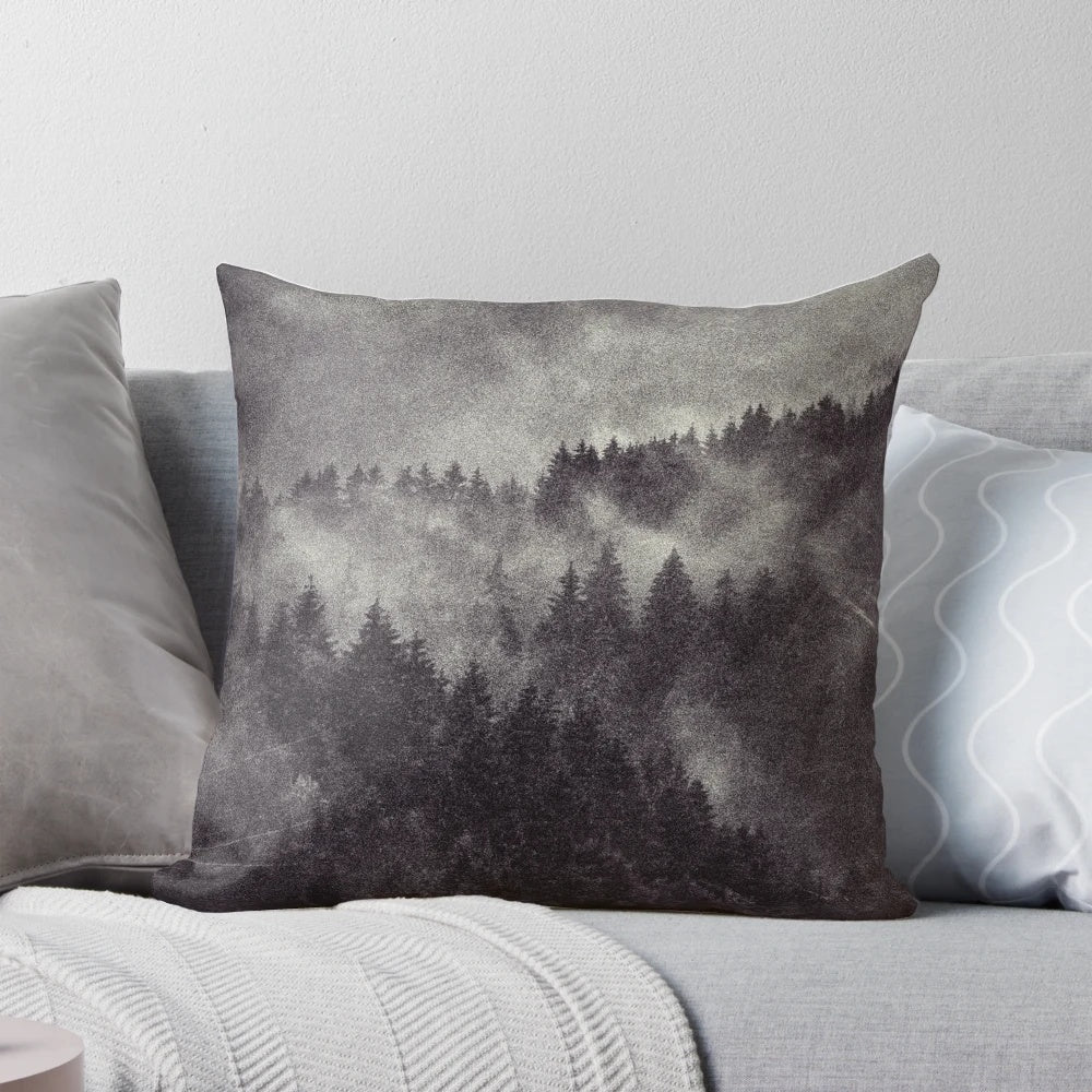 Pillow featuring a misty forest design with dark aesthetic nature shapes