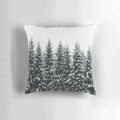 Cozy throw pillow featuring a dreamy, misty forest landscape with trees covered in fog