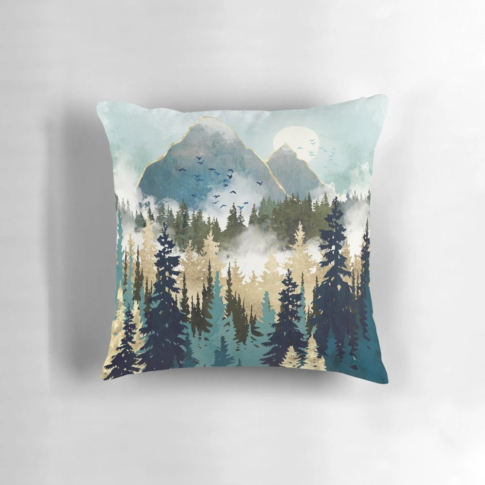 Misty pine forest landscape printed on a soft, contemporary pillow for cozy, boho inspired home decor.