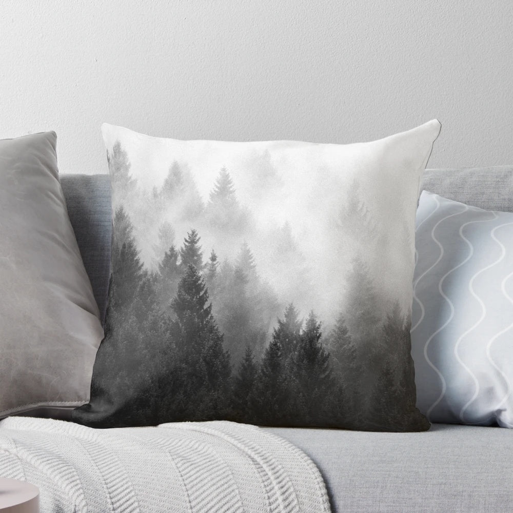 A cozy and misty forest pillow with trees covered in magical fog, perfect for fall adventures and fairytale-inspired décor.