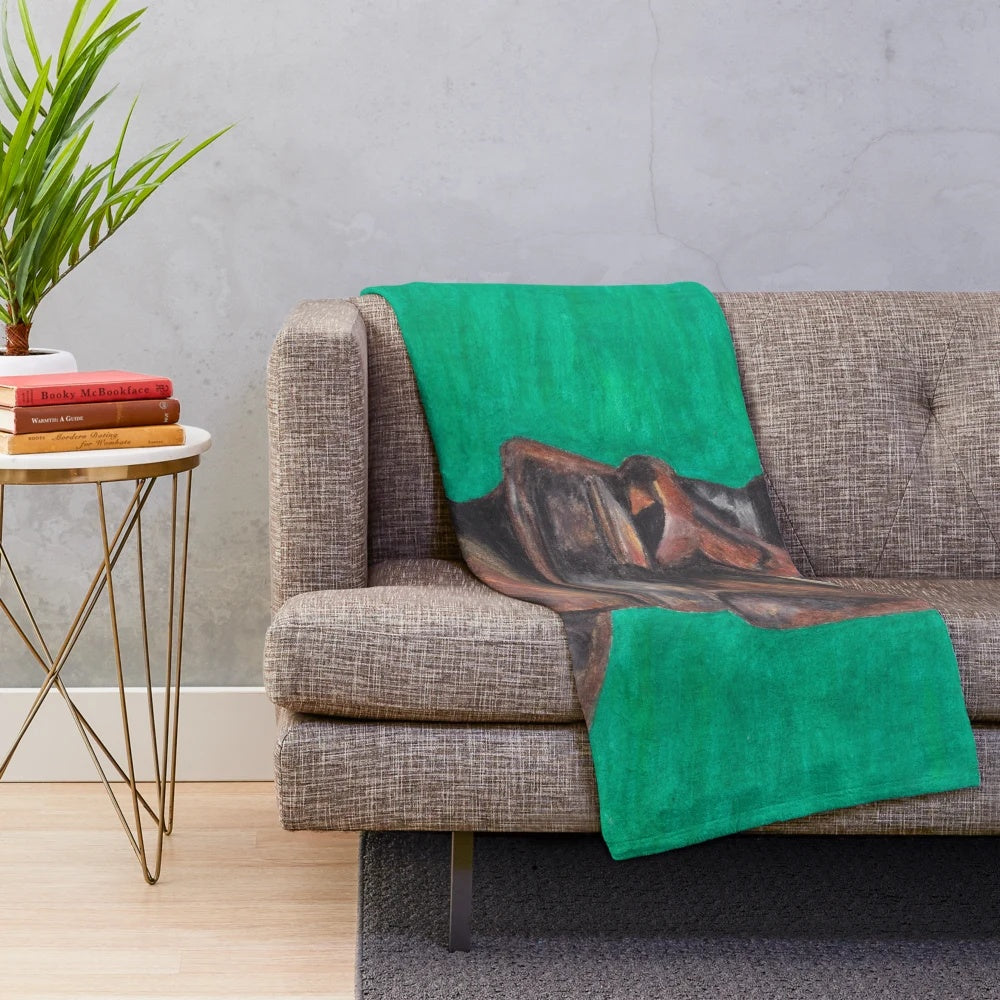 Cozy plush blanket featuring a design inspired by the iconic Moai statues of Easter Island