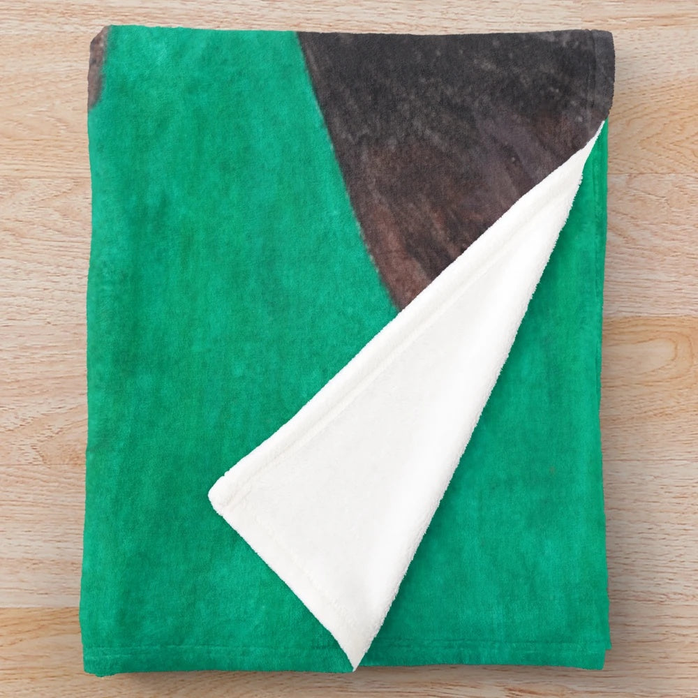 Cozy plush blanket featuring a design inspired by the iconic Moai statues of Easter Island