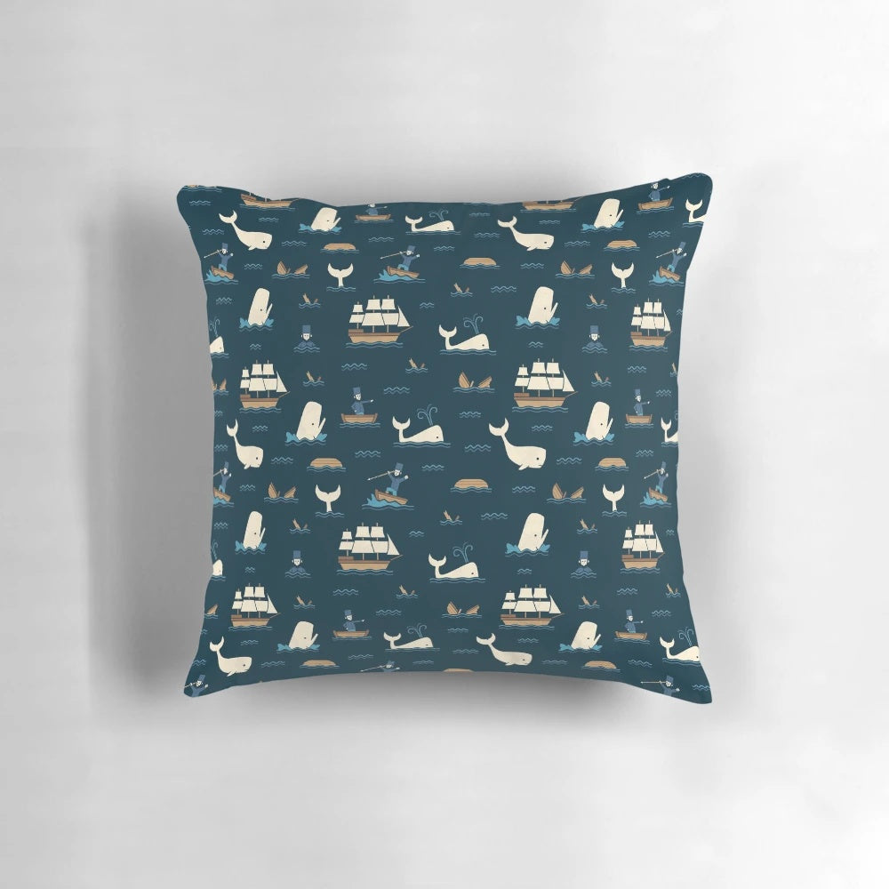 White throw pillow featuring a printed whale design inspired by the literary classic Moby Dick.