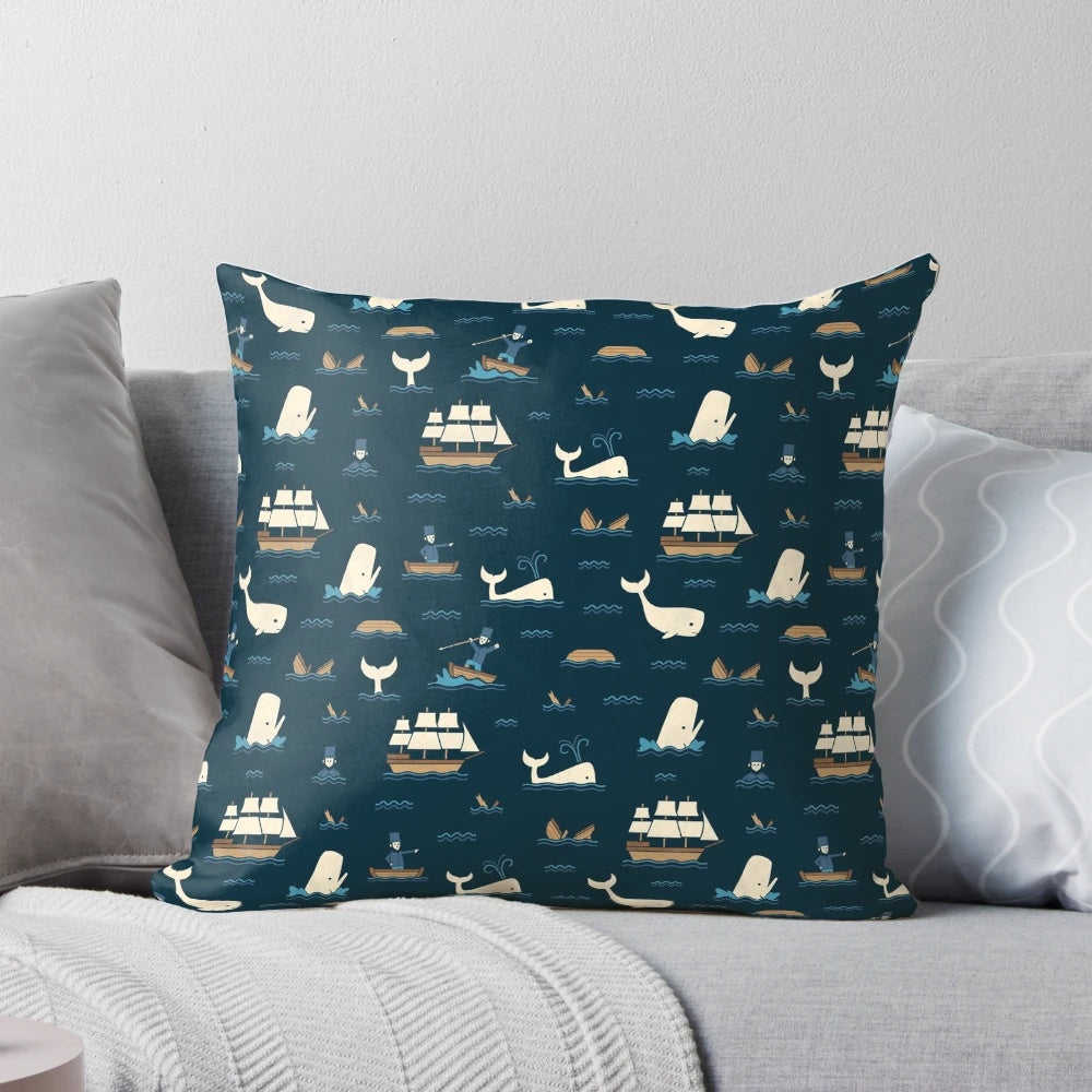 White throw pillow featuring a printed whale design inspired by the literary classic Moby Dick.