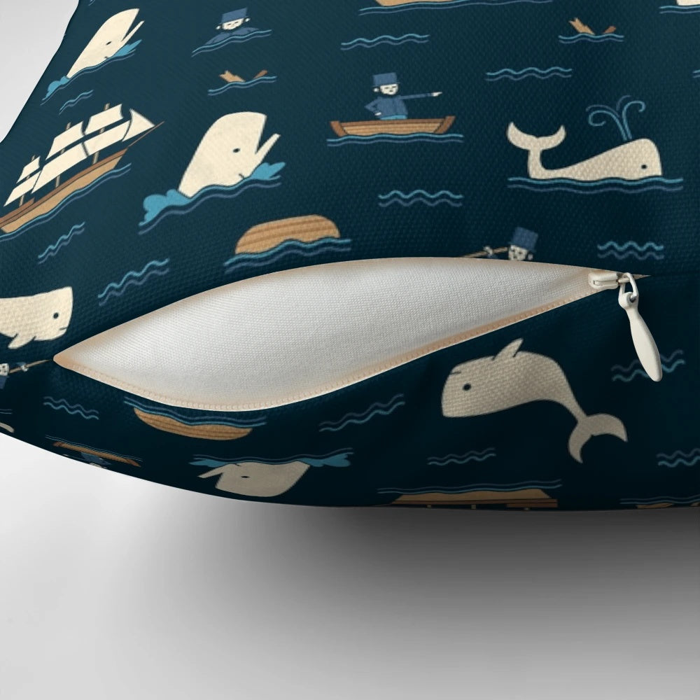 White throw pillow featuring a printed whale design inspired by the literary classic Moby Dick.