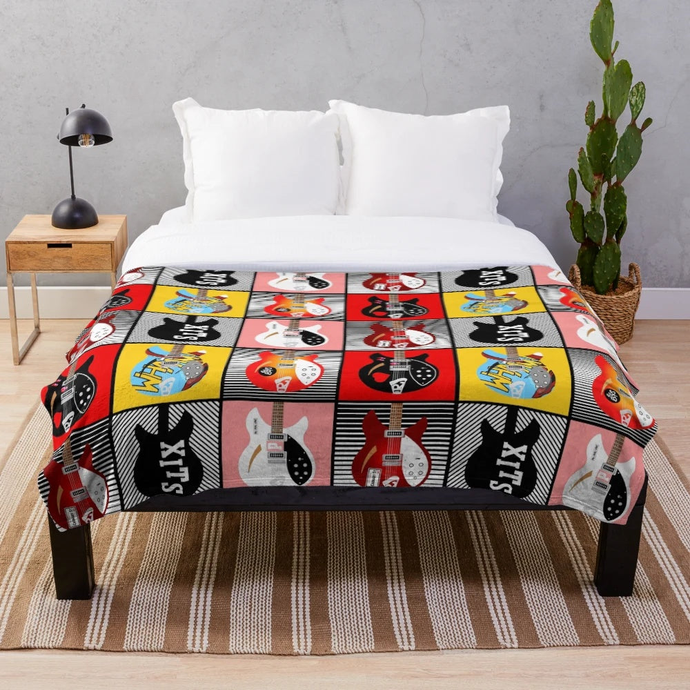 Plush blanket with Rickenbacker guitars and mod-inspired graphics