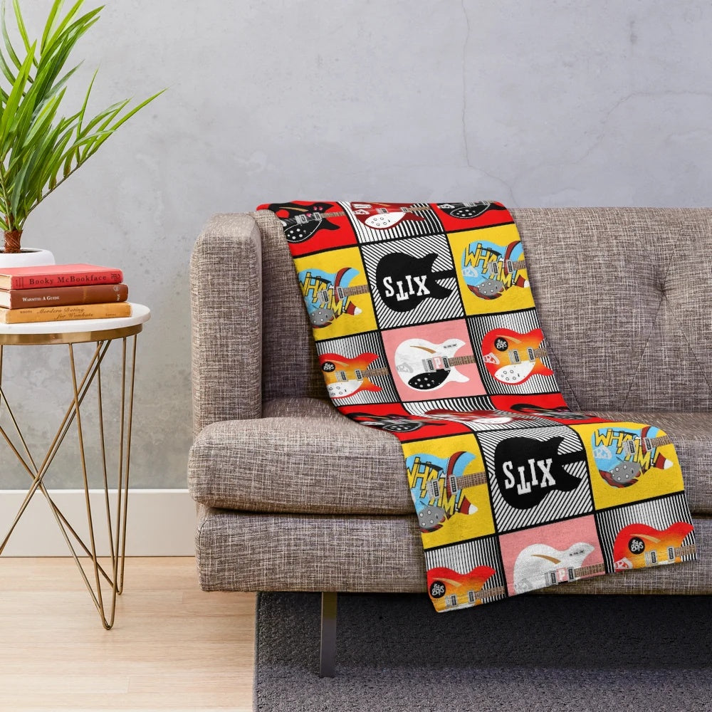 Plush blanket with Rickenbacker guitars and mod-inspired graphics