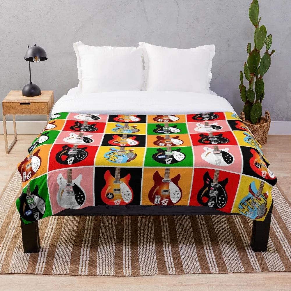 Plush blanket with pop art-style image of Paul Weller's Rickenbacker guitars from The Jam