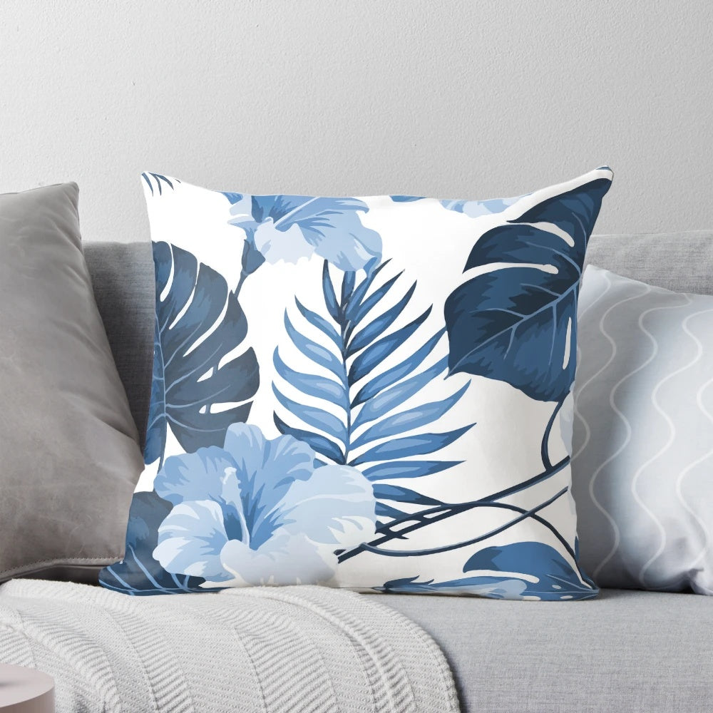 Abstract blue and periwinkle foliage design on a modern decorative throw pillow