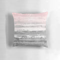 Modern abstract landscape design printed on a soft, plush throw pillow in shades of pink and gray.