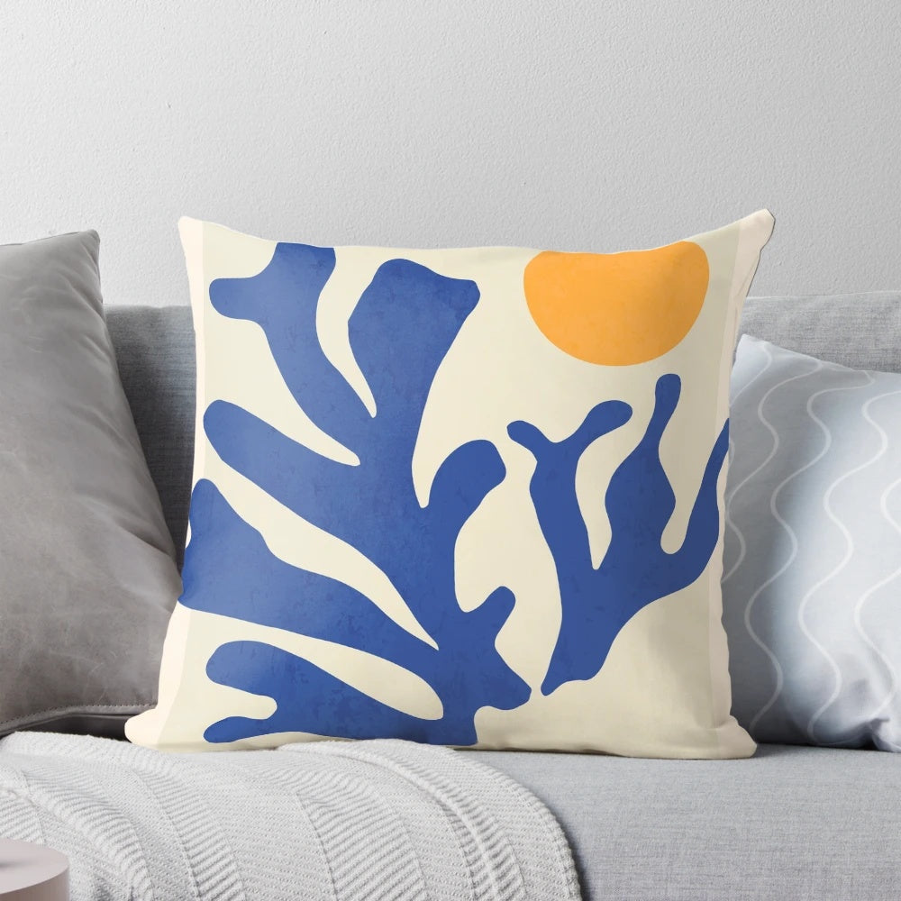 Vibrant abstract pattern pillow inspired by the paper cutouts of Henri Matisse