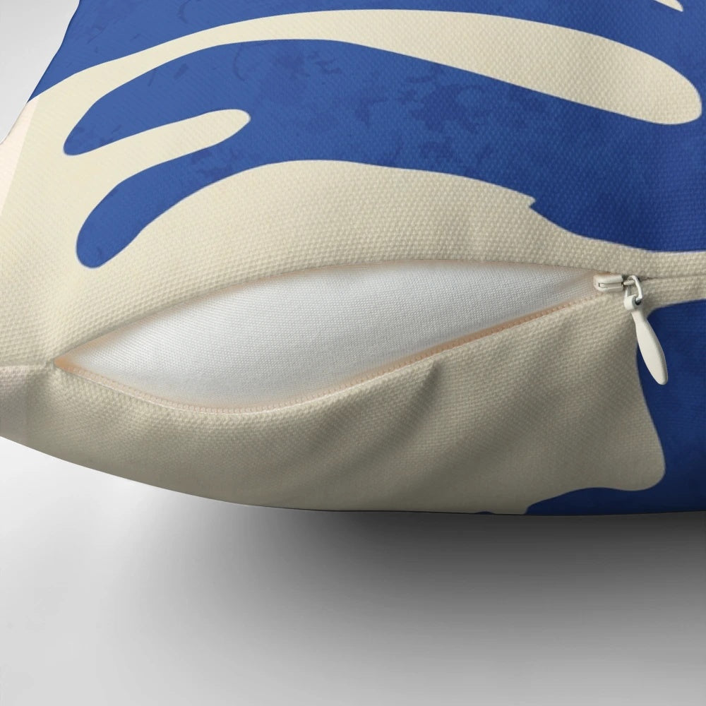 Vibrant abstract pattern pillow inspired by the paper cutouts of Henri Matisse