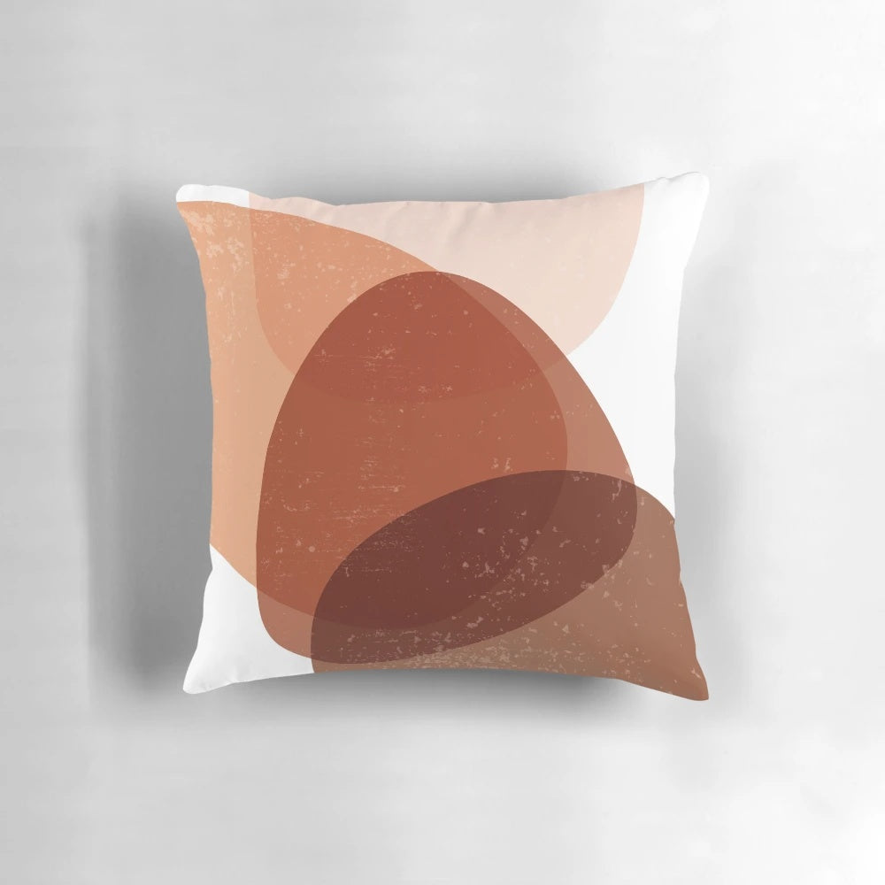Terracotta abstract art pillow with organic, minimal shapes